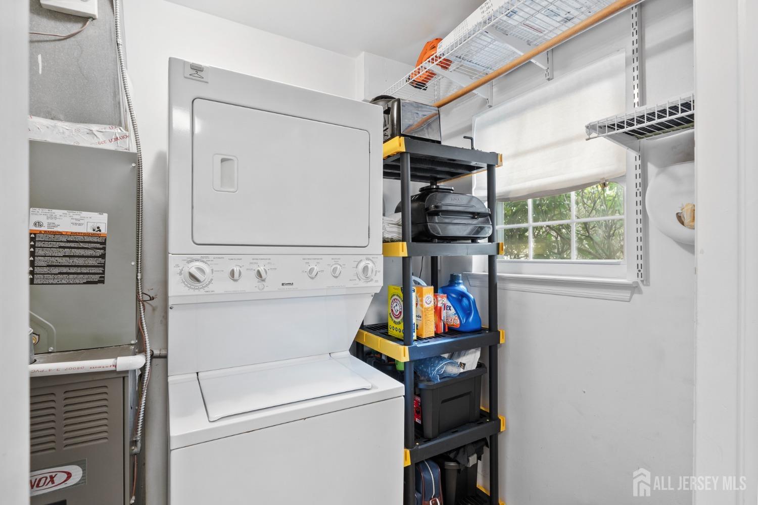 9 Lindsey Circle Old Bridge, NJ 08857 - Photo 10 of 23 a utility room with dryer and washer