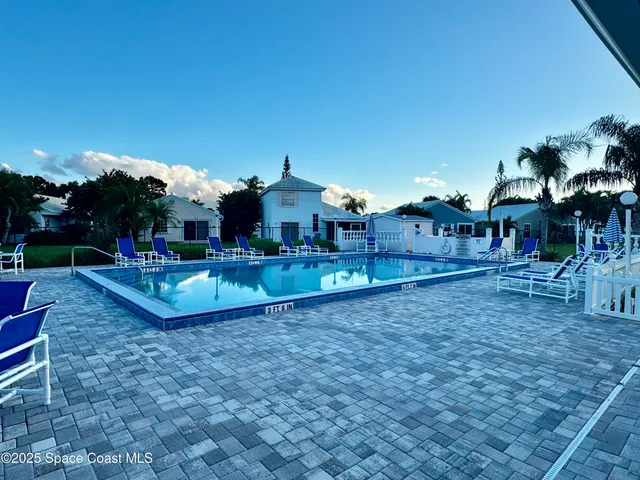 a view of a park with large trees