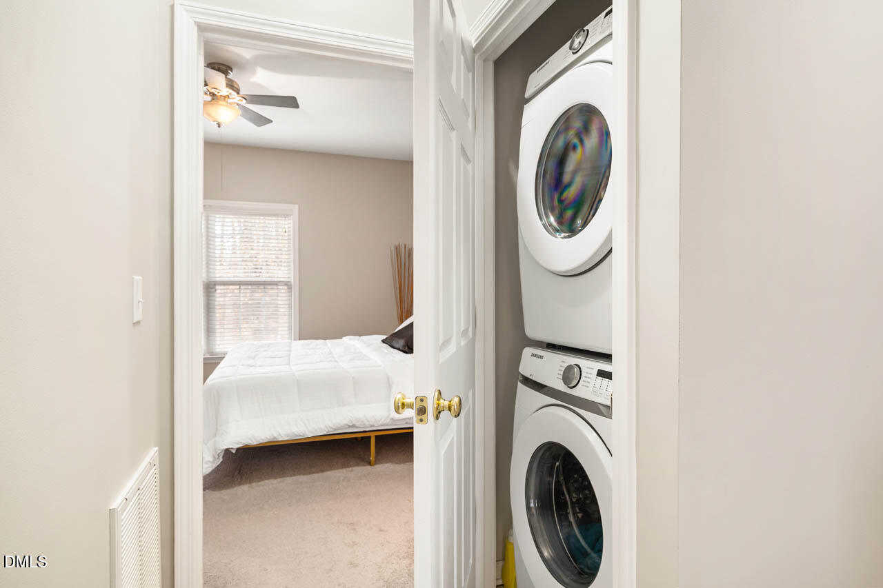 18 Scottish Lane Durham, NC 27707 - Photo 19 of 27 a utility room with dryer and washer