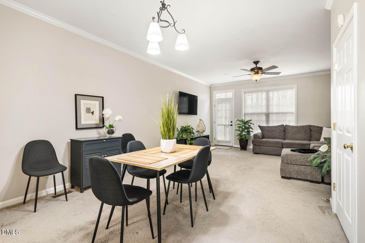 18 Scottish Lane Durham, NC 27707 - Photo 8 of 27 a view of a livingroom and a dining room with furniture window and wooden floor