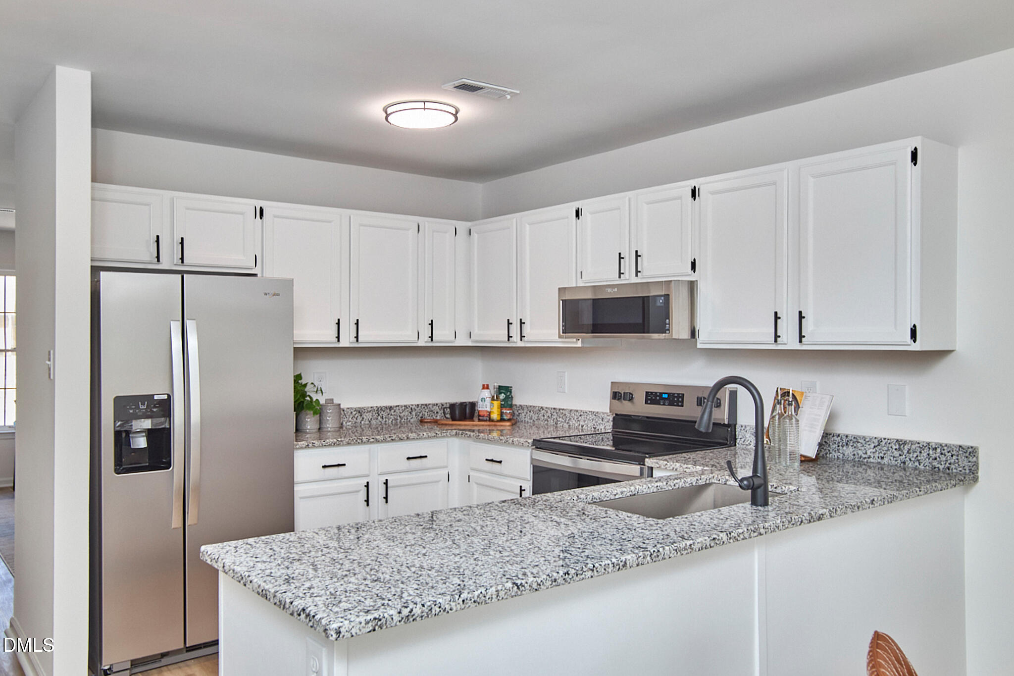 30 Fashion Place Durham, NC 27705 - Photo 11 of 30 a kitchen with stainless steel appliances granite countertop a refrigerator sink and cabinets