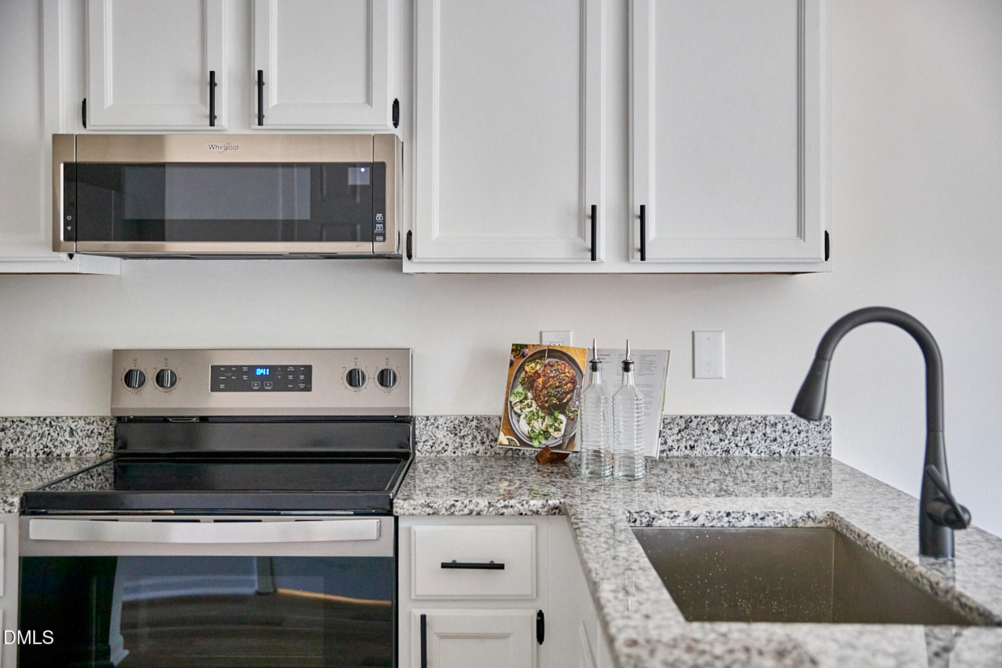 30 Fashion Place Durham, NC 27705 - Photo 13 of 30 a kitchen with a stove and a white cabinets