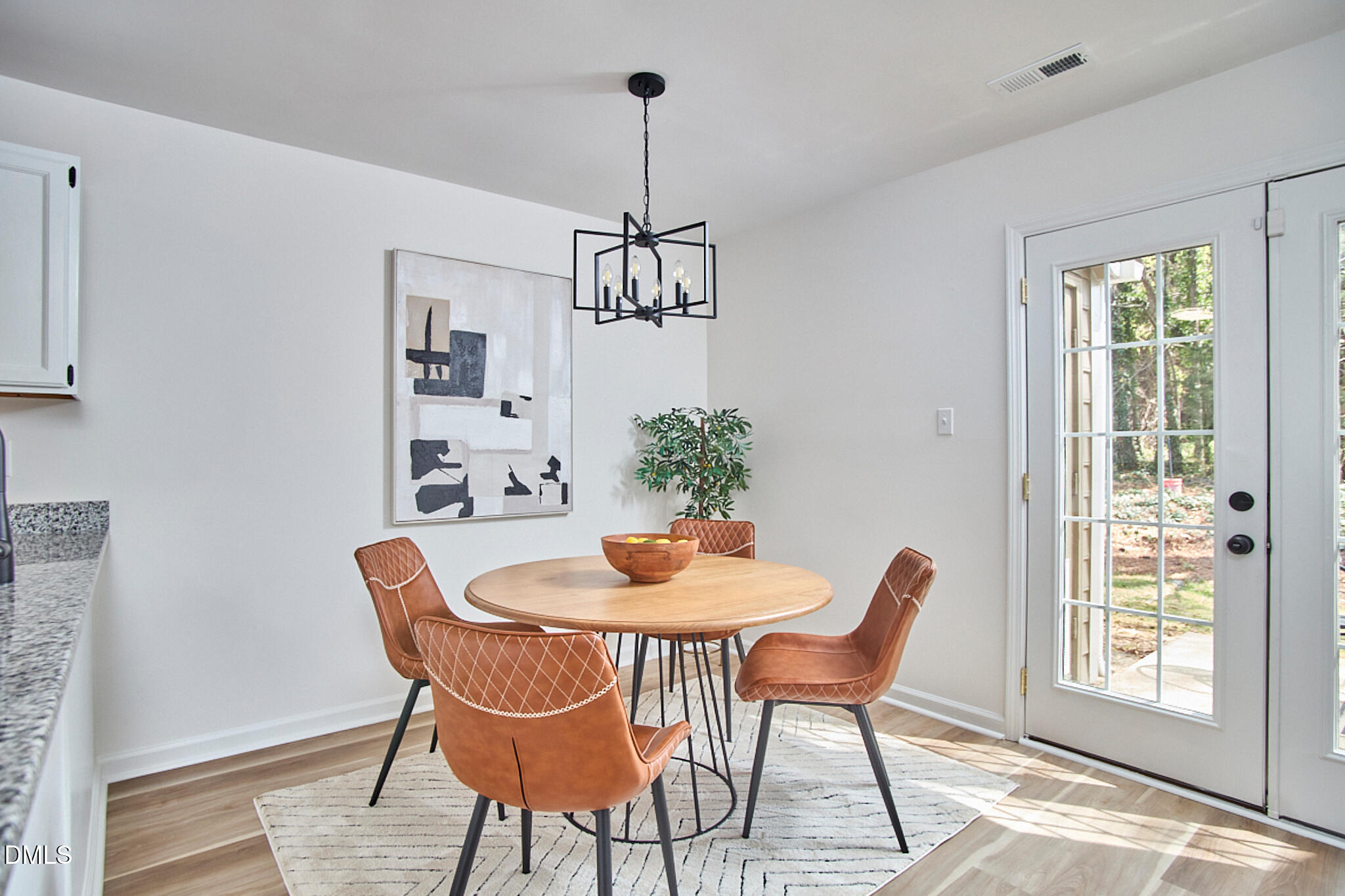 30 Fashion Place Durham, NC 27705 - Photo 16 of 30 a dining room with furniture a chandelier and wooden floor