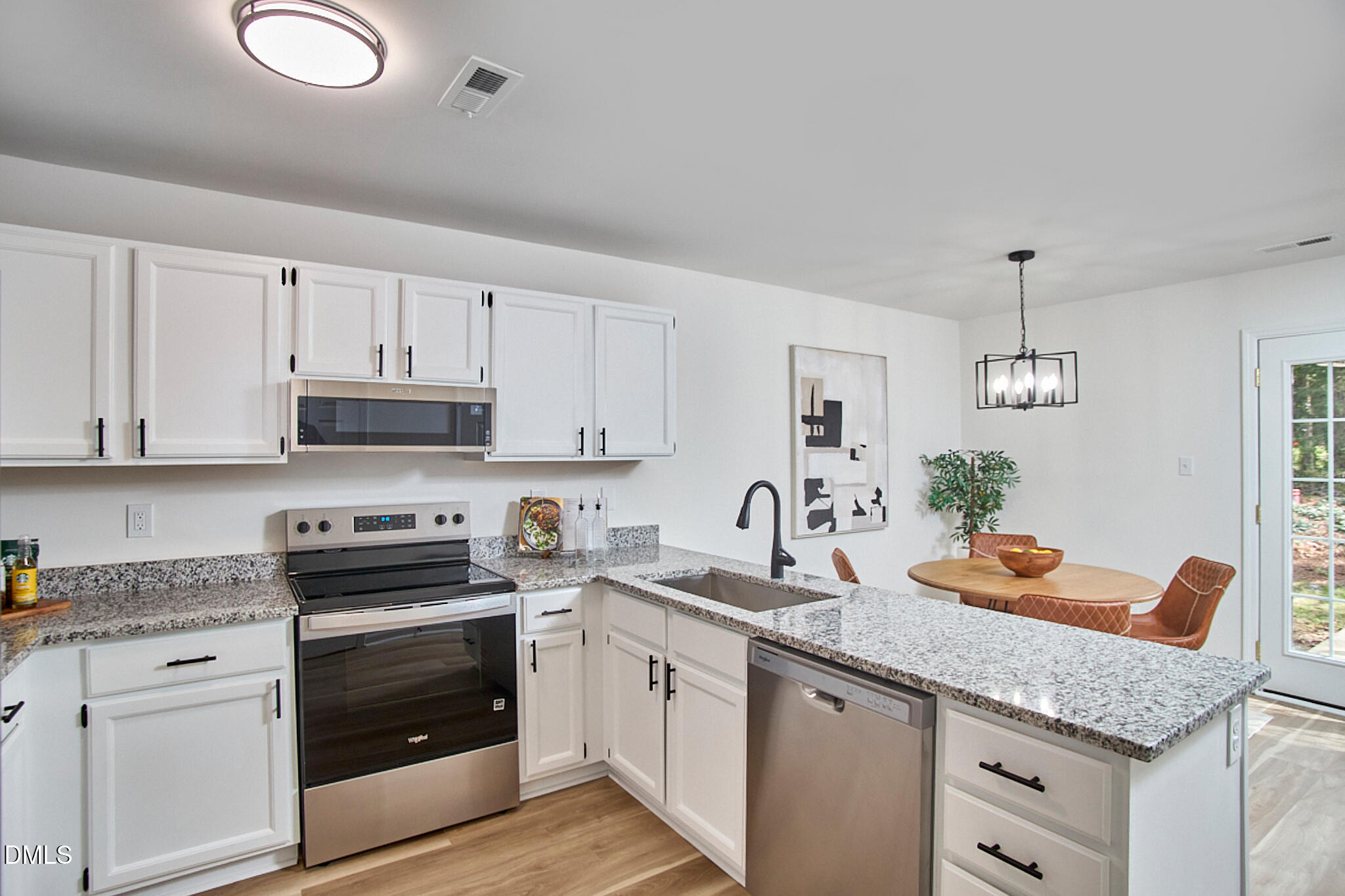 30 Fashion Place Durham, NC 27705 - Photo 10 of 30 a kitchen with granite countertop white cabinets and white appliances