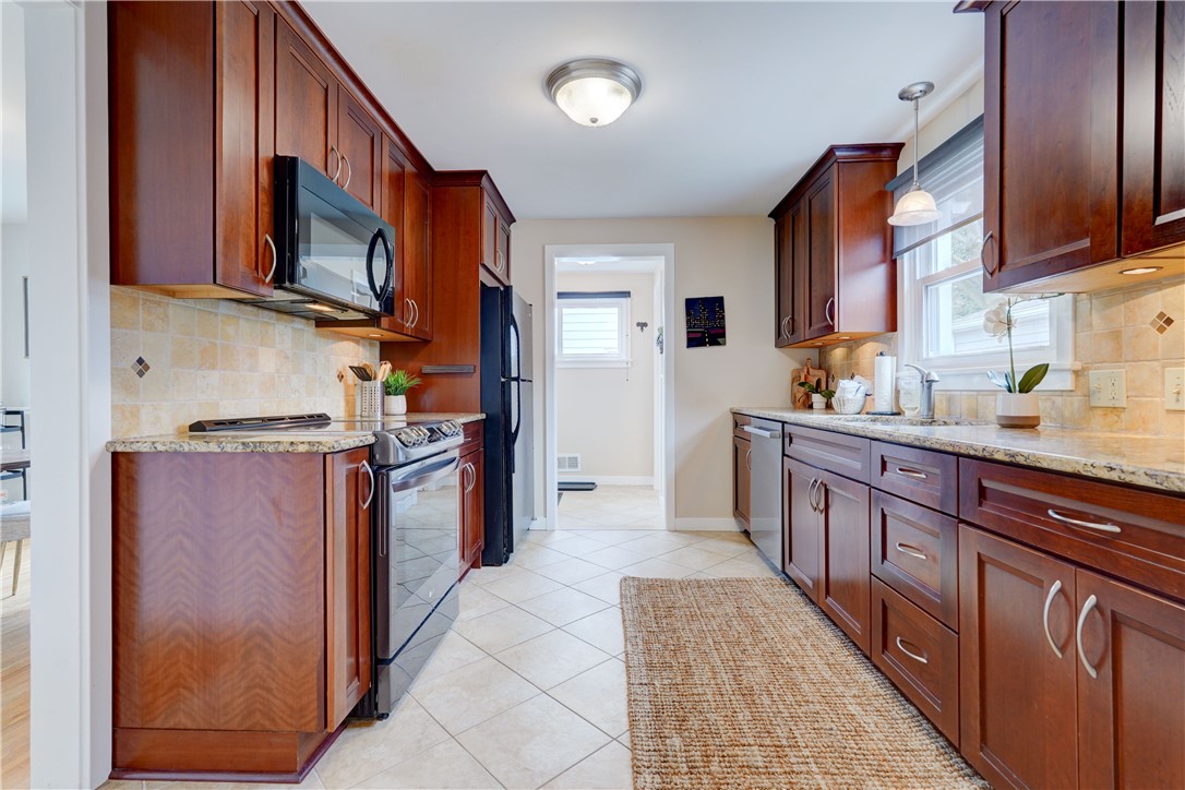 269 Hartsdale Road Irondequoit, NY 14622 - Photo 22 of 48 Side entry at end of kitchen