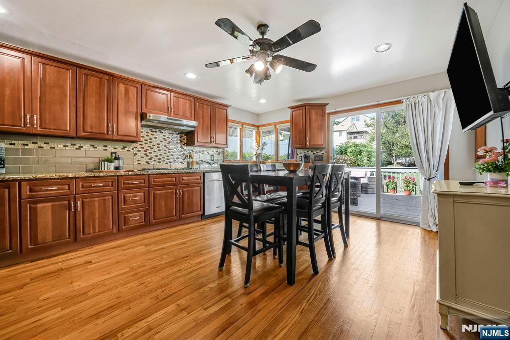 36 Clara Street North Haledon, NJ 07508 - Photo 14 of 31 a view of a dining room with furniture window and wooden floor