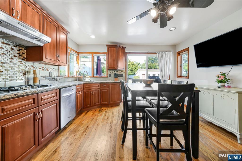 36 Clara Street North Haledon, NJ 07508 - Photo 19 of 31 a large kitchen with a table and chairs