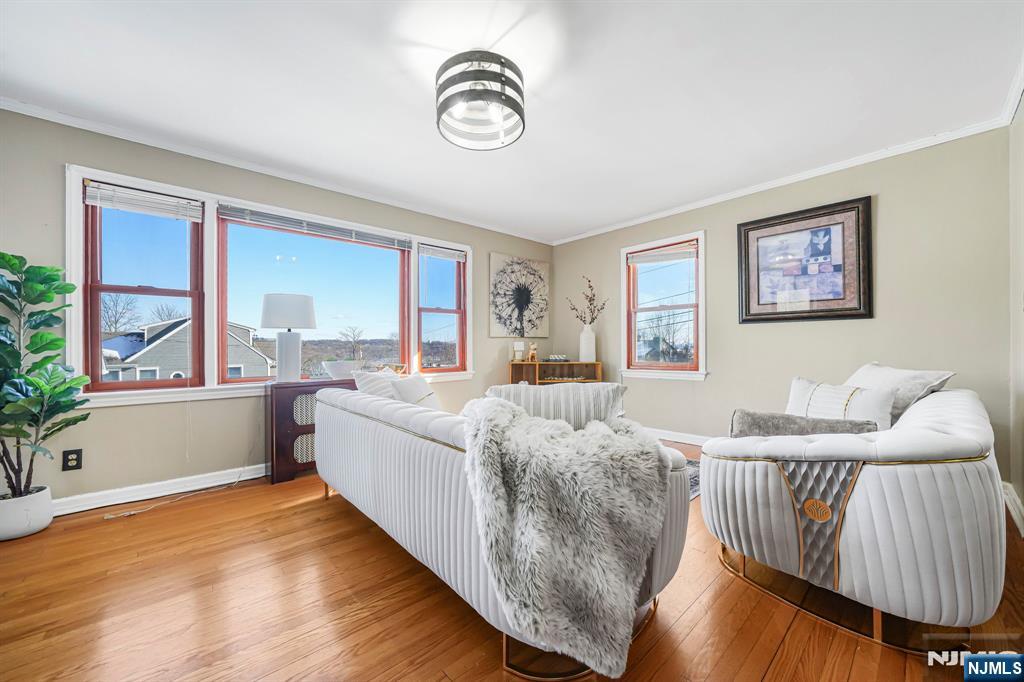 36 Clara Street North Haledon, NJ 07508 - Photo 3 of 31 a living room with furniture and a large window