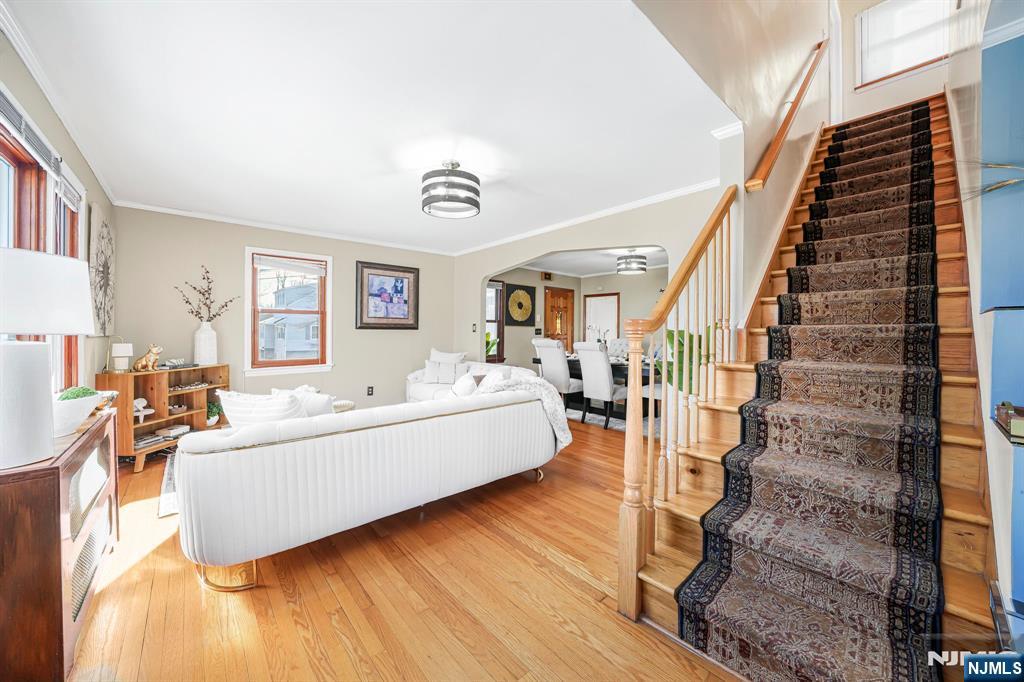 36 Clara Street North Haledon, NJ 07508 - Photo 4 of 31 a living room with furniture and a wooden floor
