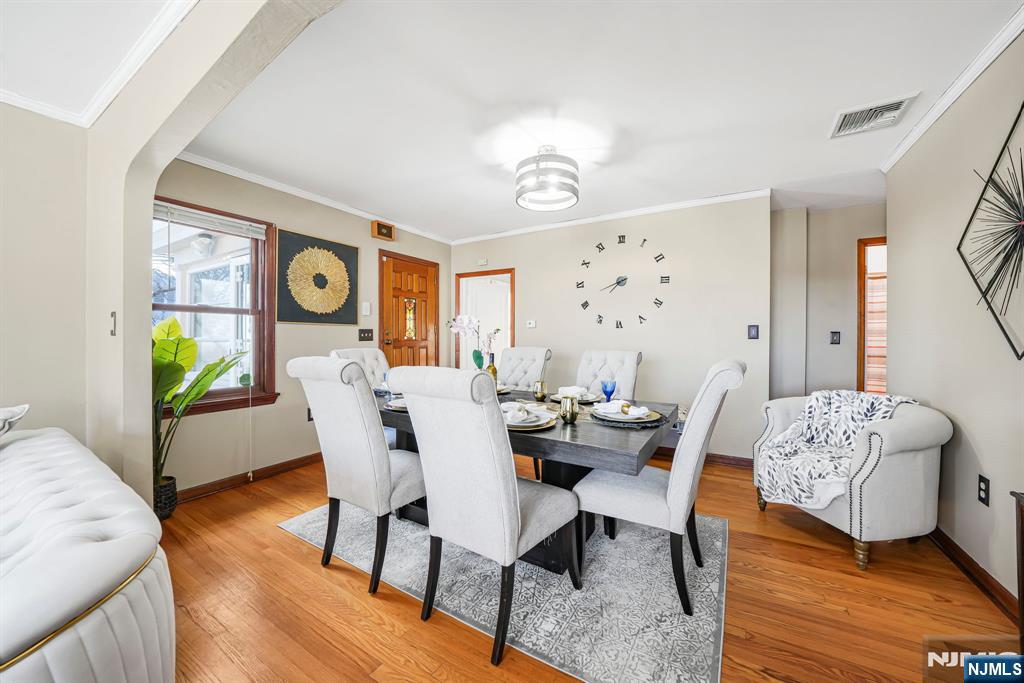 36 Clara Street North Haledon, NJ 07508 - Photo 5 of 31 a view of a dining room with furniture window and wooden floor