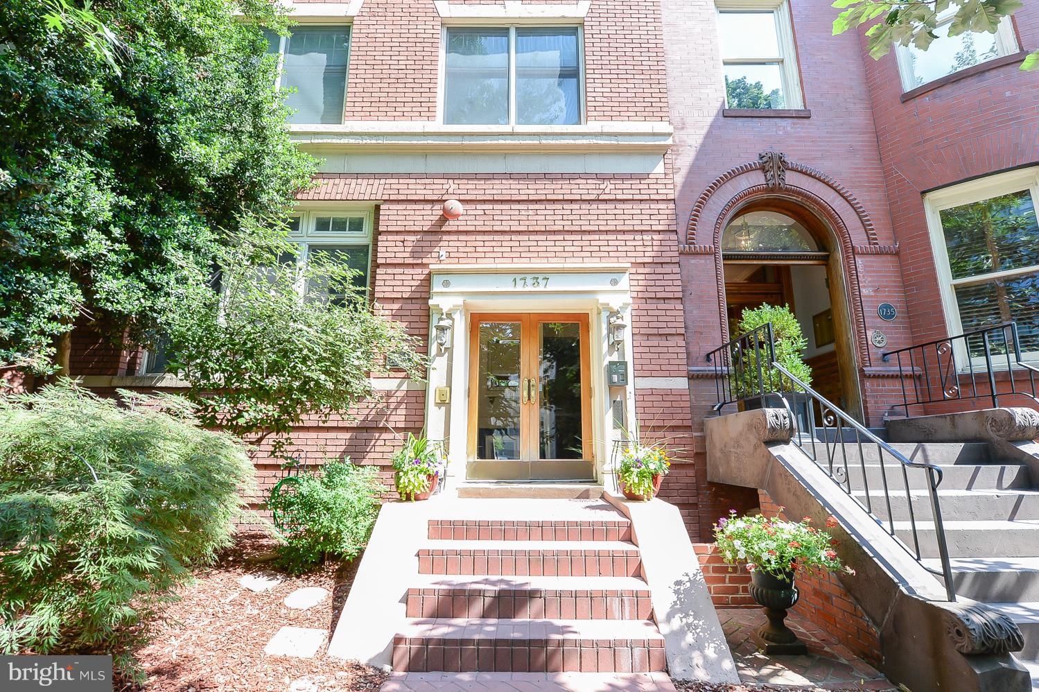 1737 P Street Northwest, Unit 201 Washington, DC 20036 - Photo 1 of 15 a front view of a house with garden