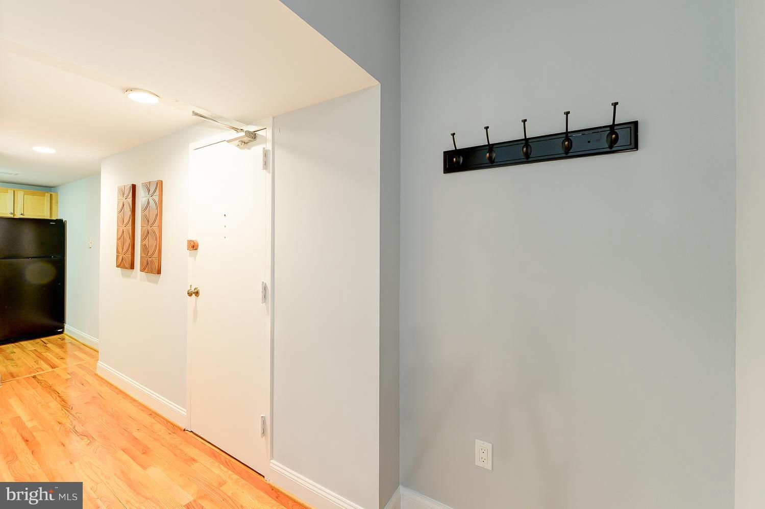 1737 P Street Northwest, Unit 201 Washington, DC 20036 - Photo 2 of 15 a view of a kitchen with an empty space and a window