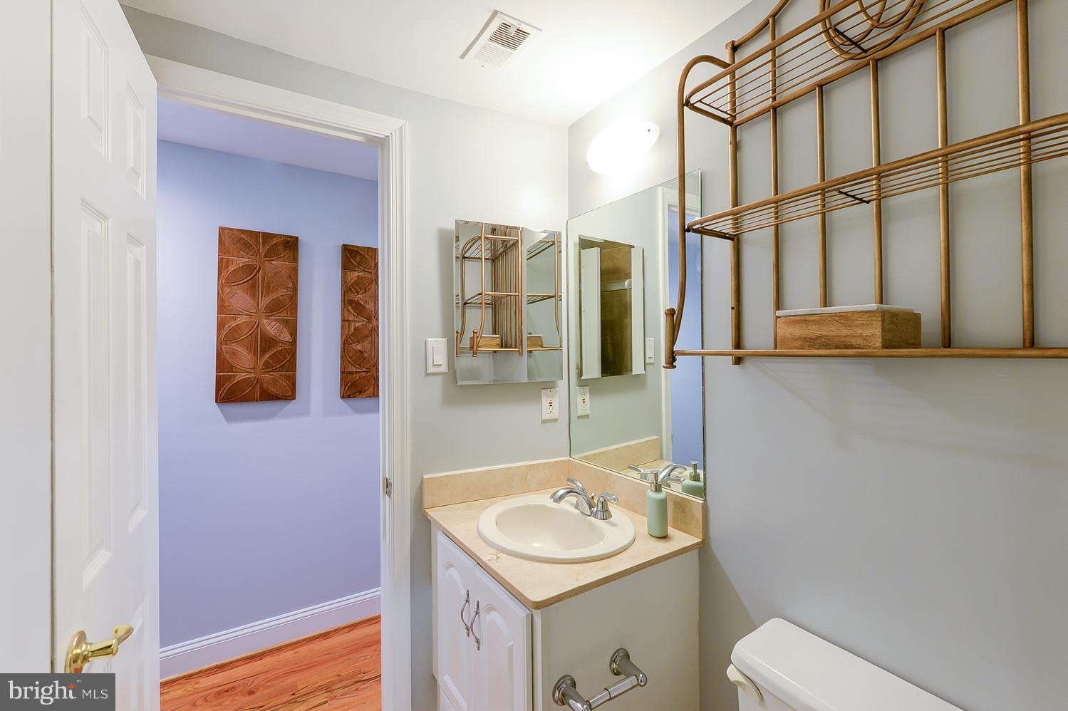 1737 P Street Northwest, Unit 201 Washington, DC 20036 - Photo 11 of 15 a bathroom with a sink toilet and shower