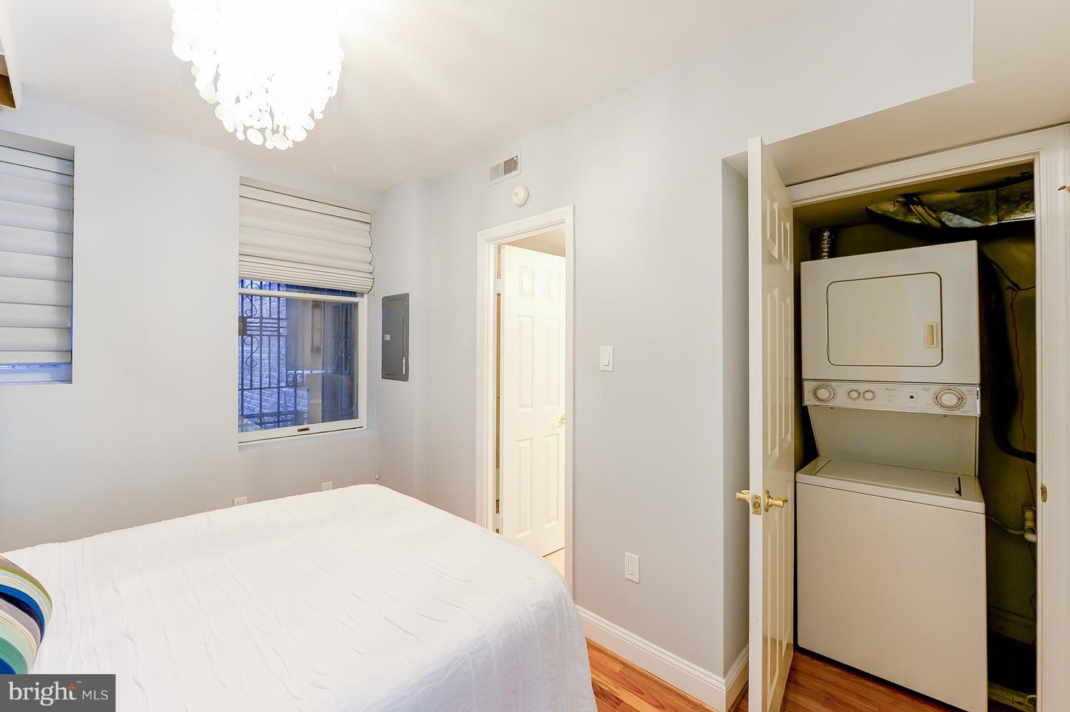 1737 P Street Northwest, Unit 201 Washington, DC 20036 - Photo 8 of 15 a bedroom with a bed and a window