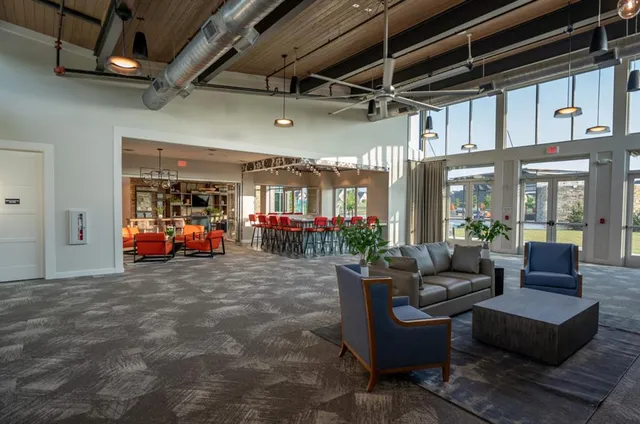 an aerial view of a house with outdoor space