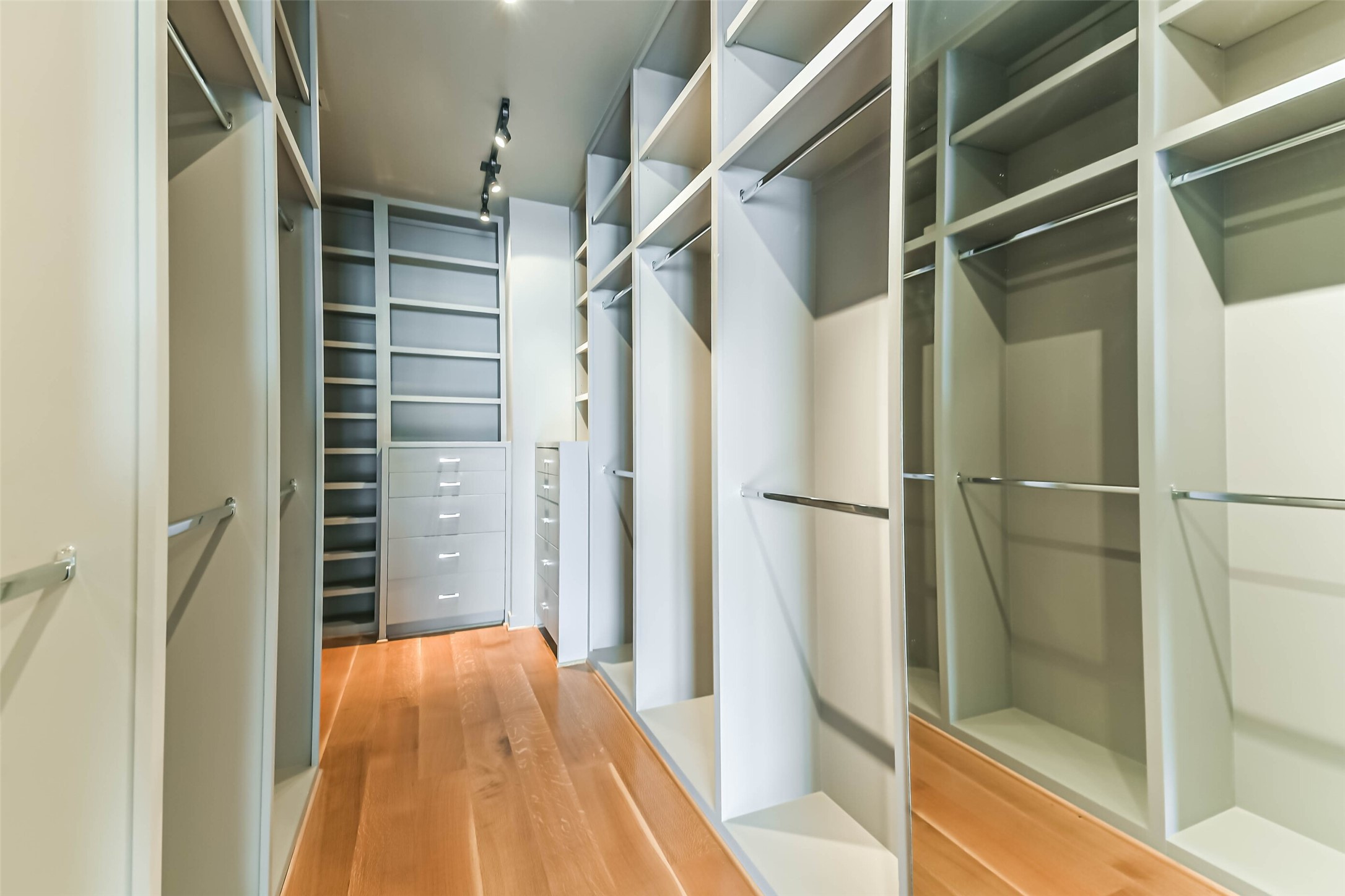 815 Alexander Street Houston, TX 77007 - Photo 33 of 49 Dream walk-in closet with extensive custom built-in organization.