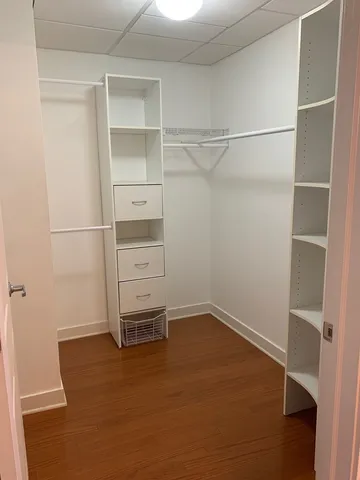 a view of an empty walk in closet