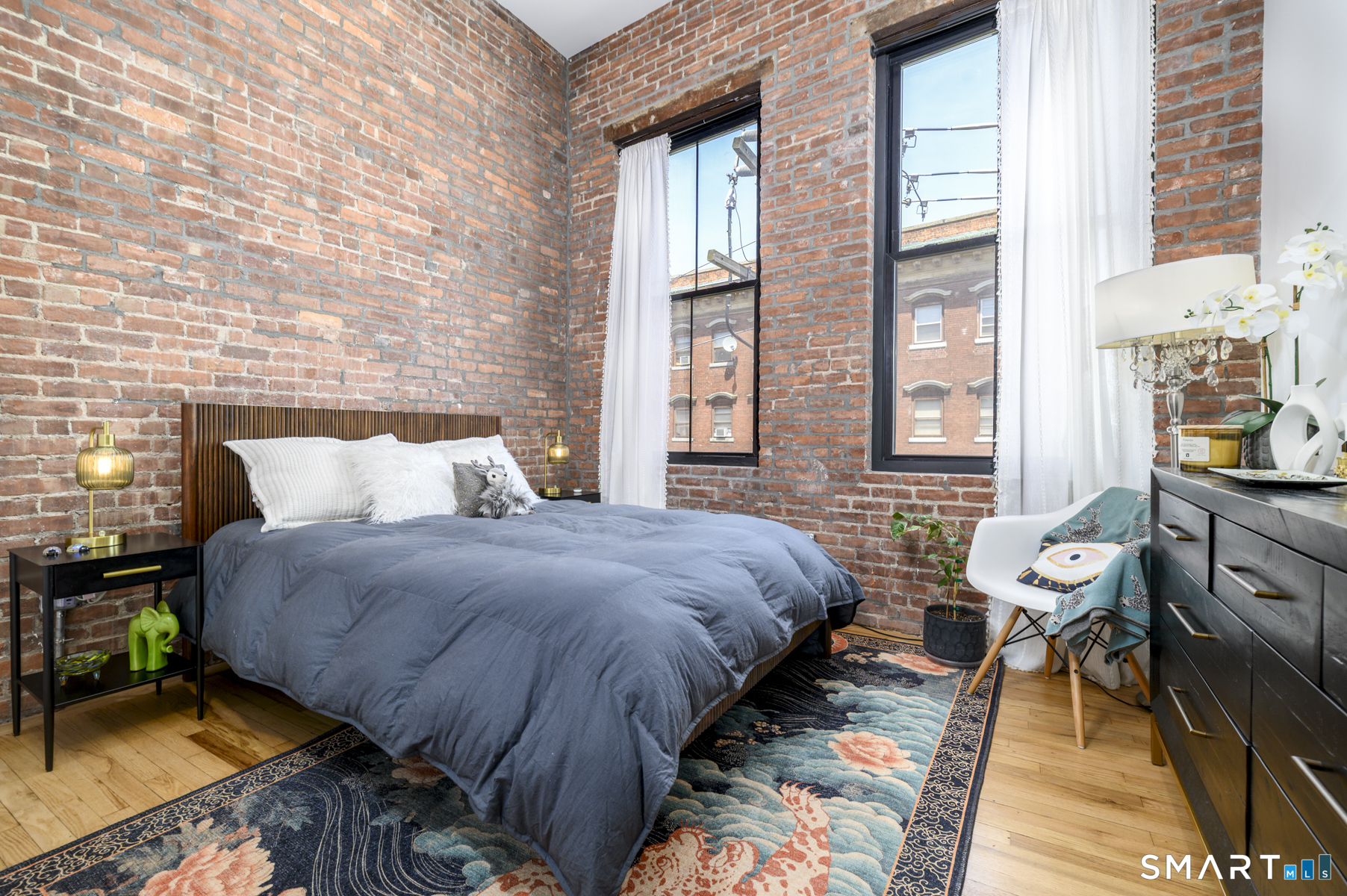 10 Commerce Street, Unit 3 Norwalk, CT 06850 - Photo 11 of 16 High ceilings, exposed bricks and sunlight for days!