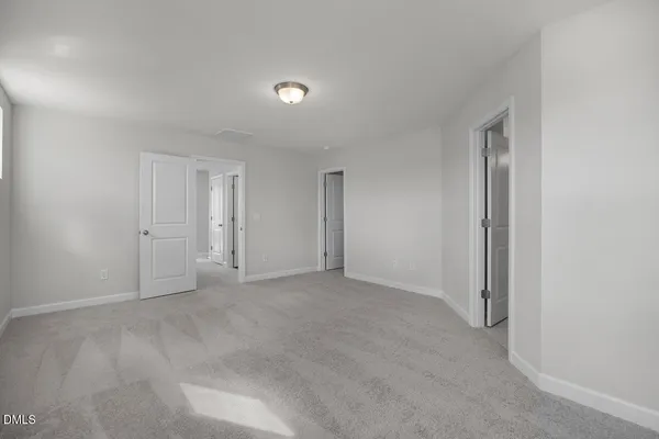 a bathroom with a shower and a sink