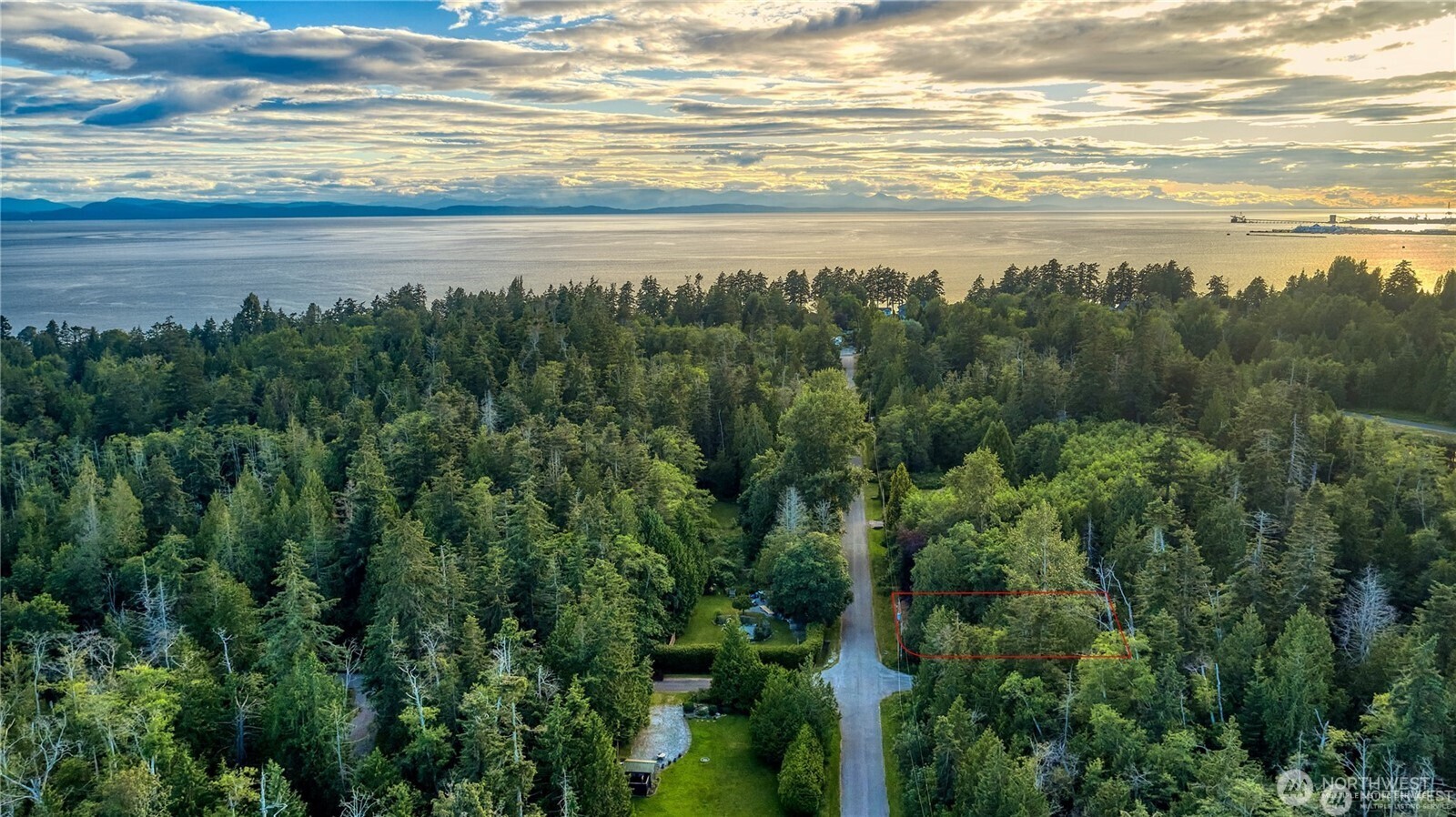1394 Rex Street Point Roberts, WA 98281 - Photo 2 of 6 a view of an ocean and mountain