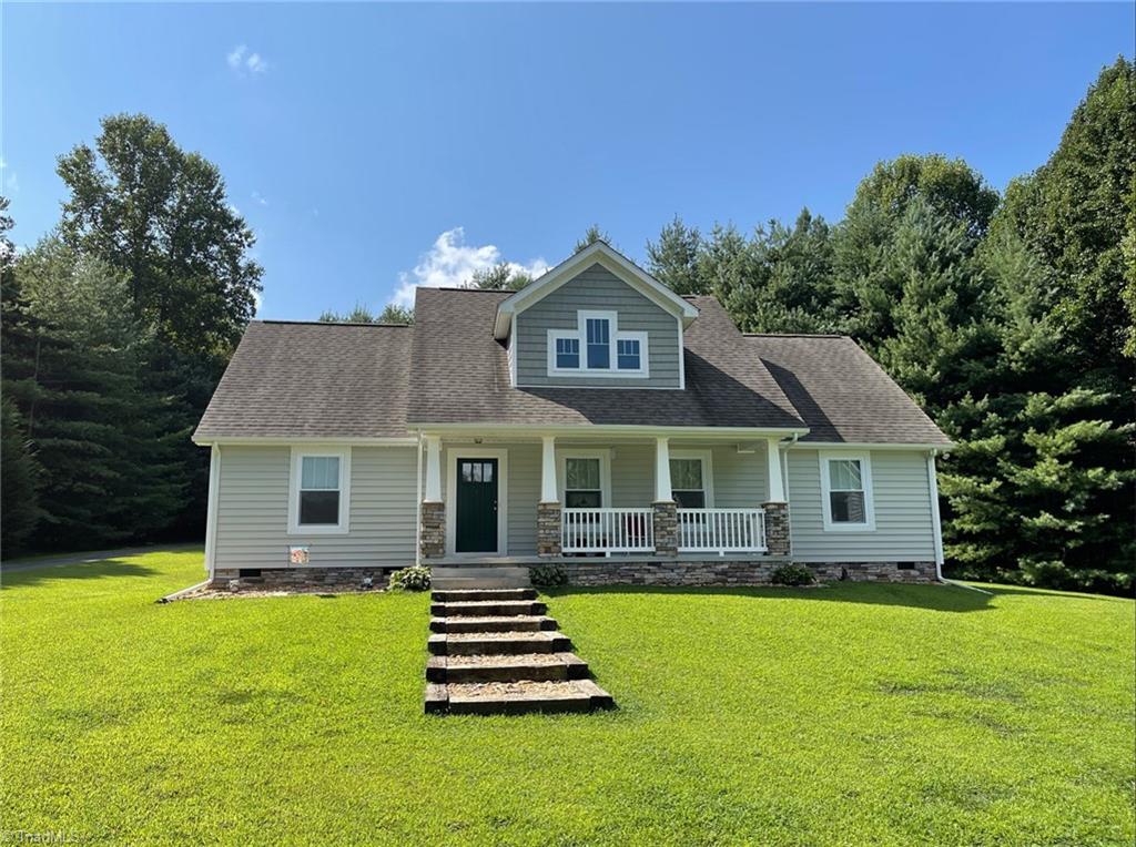 653 Little Elkin Church Road Ronda, NC 28670 - Photo 1 of 47 Pre-inspected, worry free home surrounded by beauty, peace, and quiet