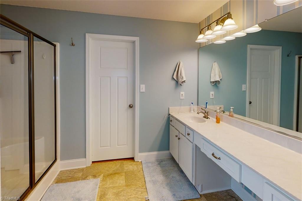 653 Little Elkin Church Road Ronda, NC 28670 - Photo 17 of 47 Master bath with walk-in shower