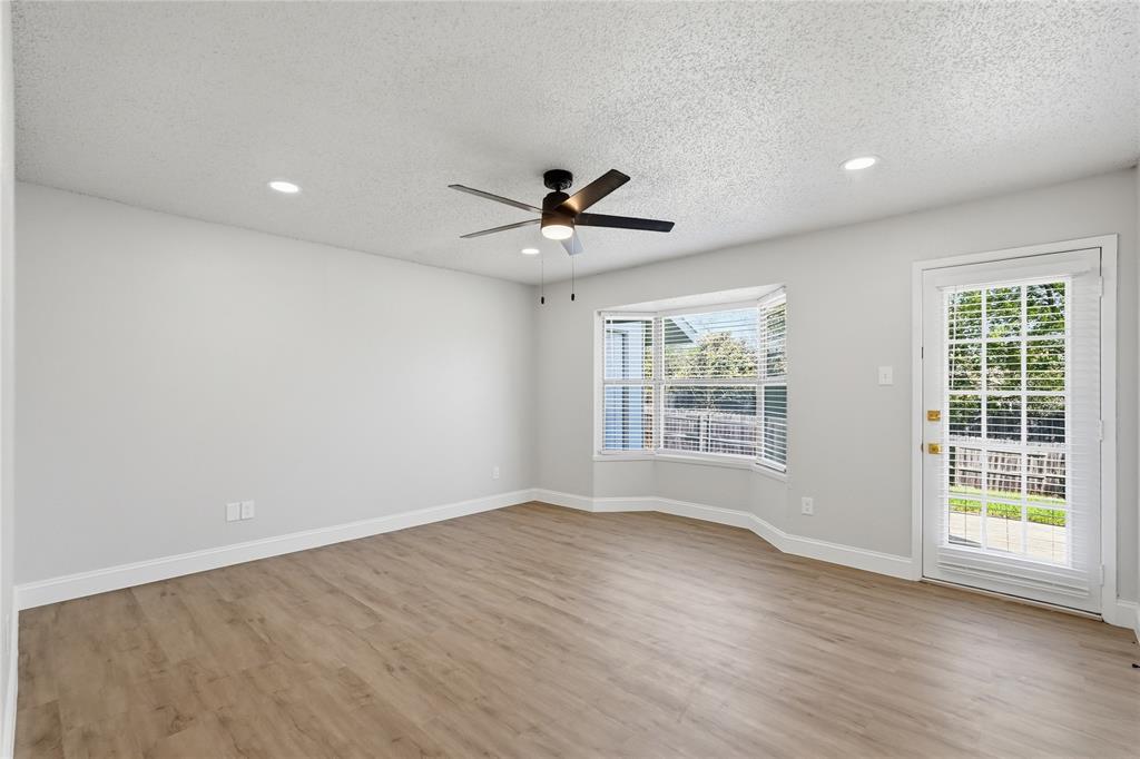 5514 Round Rock Road Garland, TX 75044 - Photo 13 of 37 a view of an empty room with a window