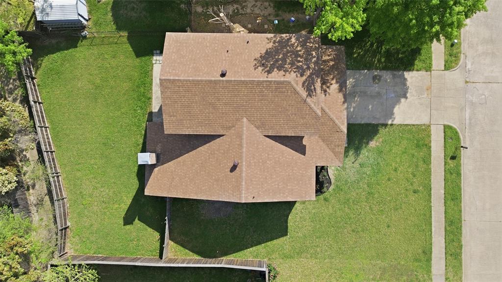 5514 Round Rock Road Garland, TX 75044 - Photo 34 of 37 an aerial view of a house with a yard