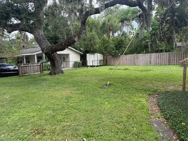 a house view with a garden space