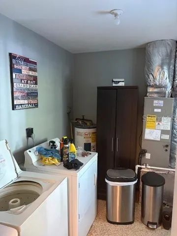 a kitchen with a sink and a stove top oven
