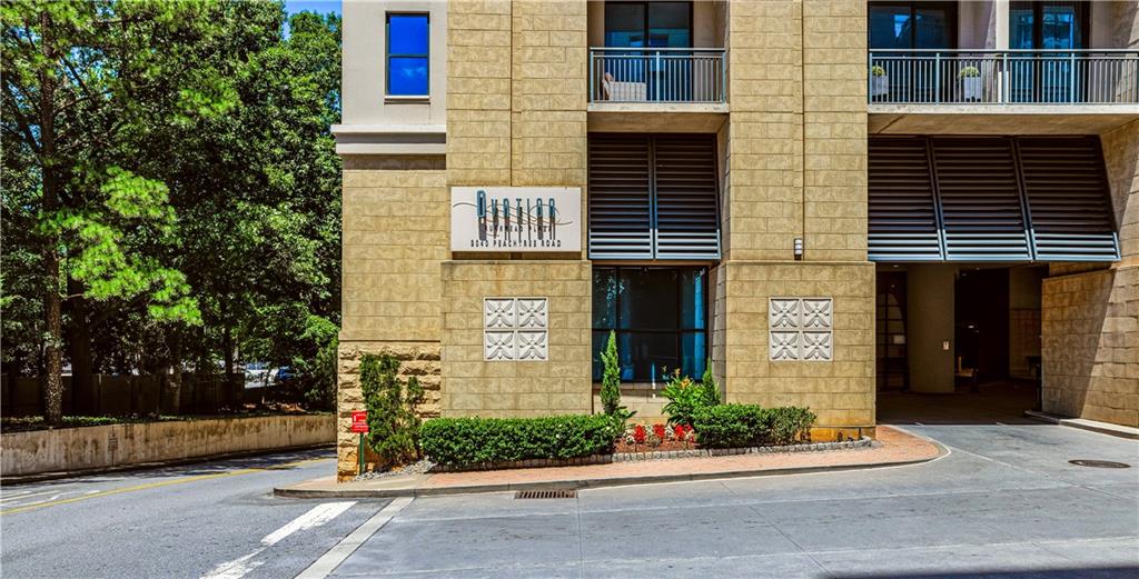 3040 Peachtree Road Northwest, Unit 1503 Atlanta, GA 30305 - Photo 38 of 38 a front view of a house