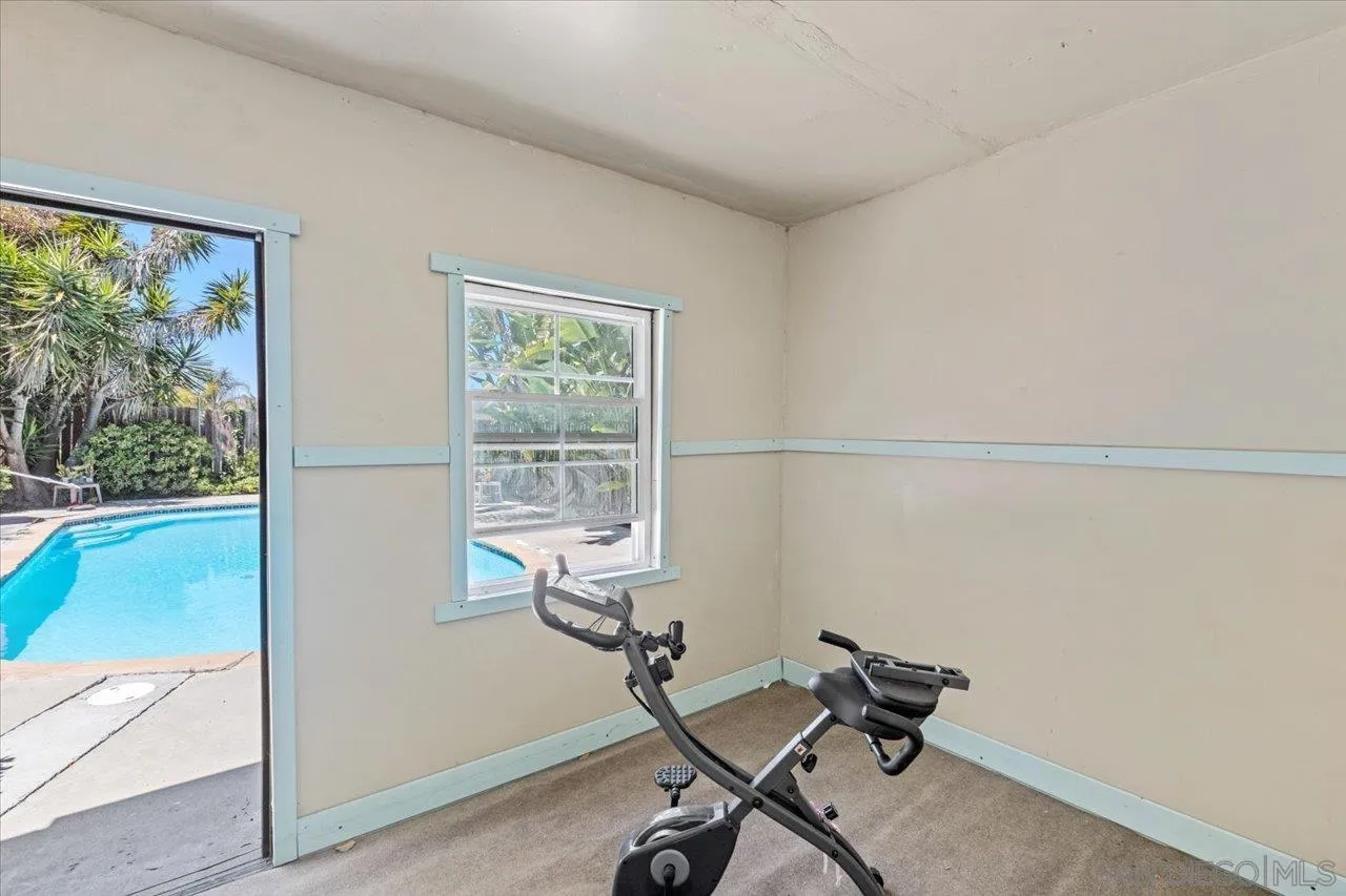 2337 Fallingleaf Road Oceanside, CA 92056 - Photo 30 of 34 a view of a workspace with furniture and a window