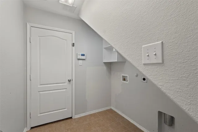 a view of a hallway with an entryway