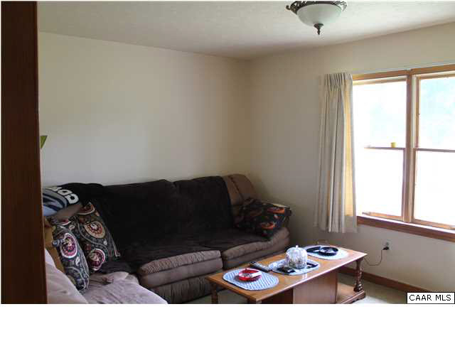 4605 Wesley Chapel Road Free Union, VA 22940 - Photo 6 of 13 a living room with furniture and window