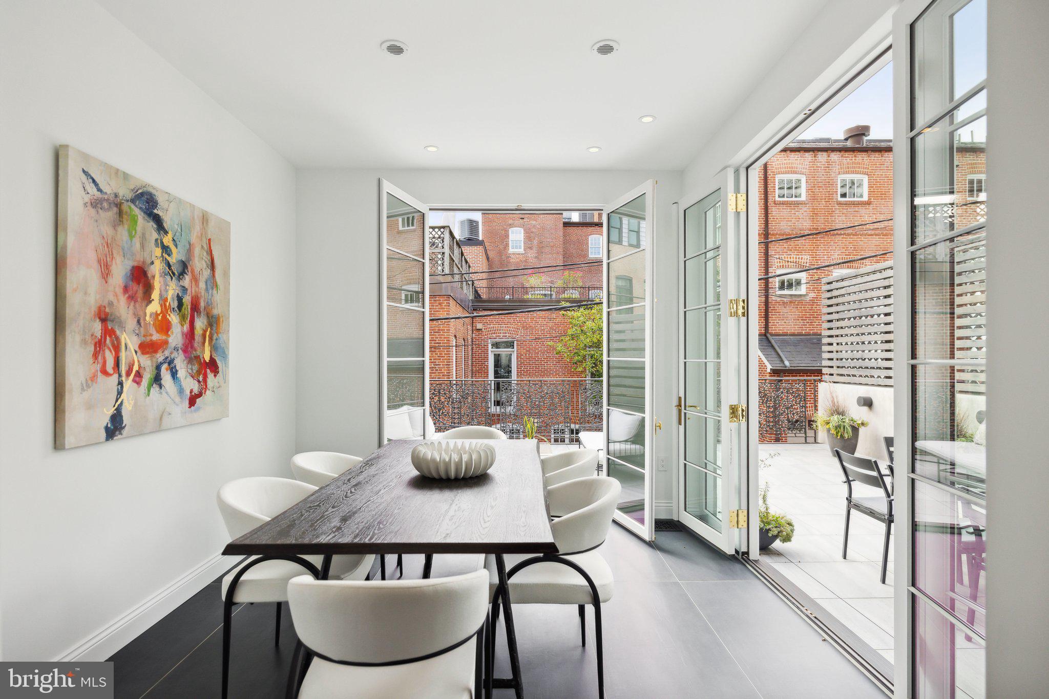 2120 Bancroft Place Northwest Washington, DC 20008 - Photo 11 of 30 a dining room with furniture and wooden floor