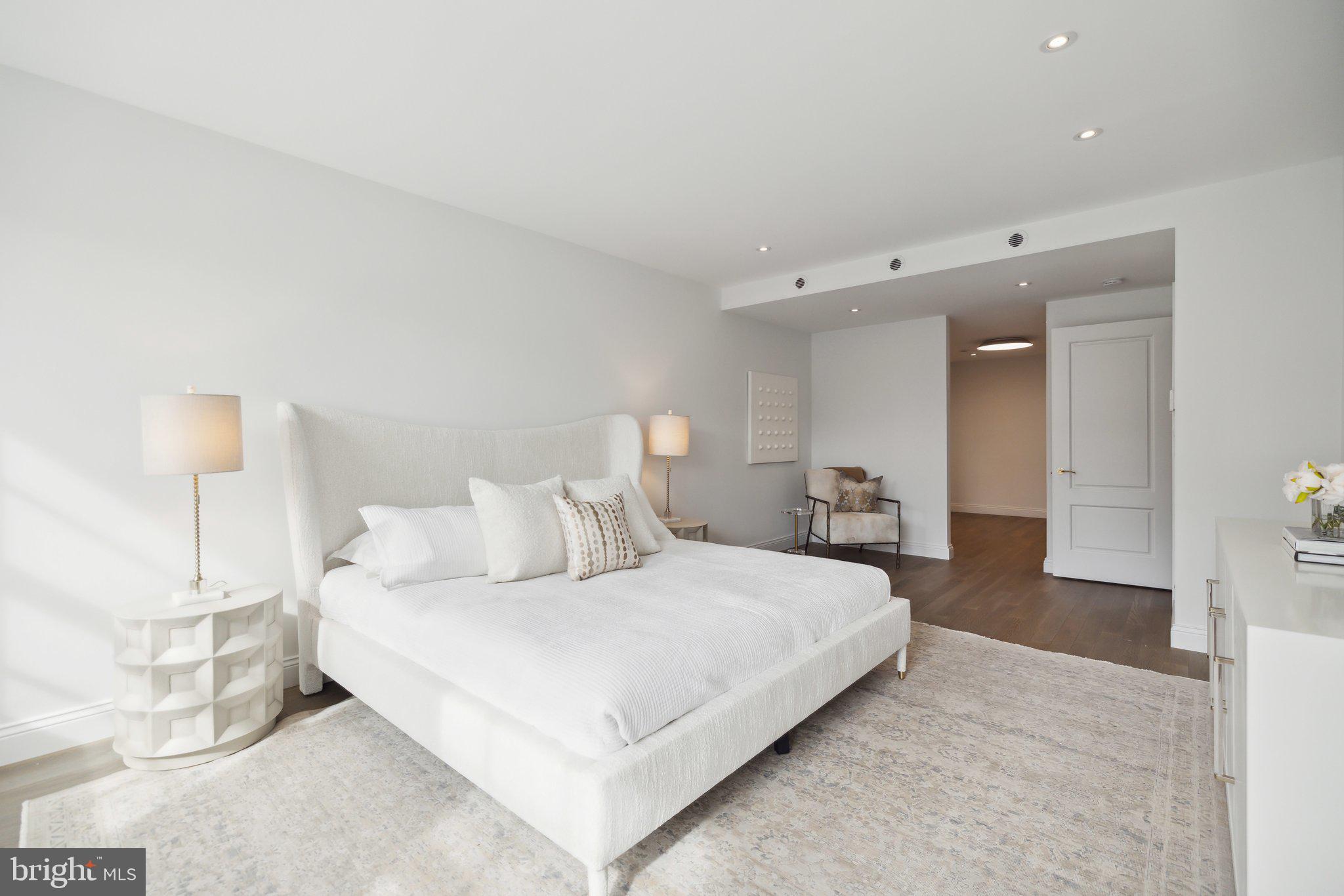 2120 Bancroft Place Northwest Washington, DC 20008 - Photo 17 of 30 a bedroom with a bed and a night lamp