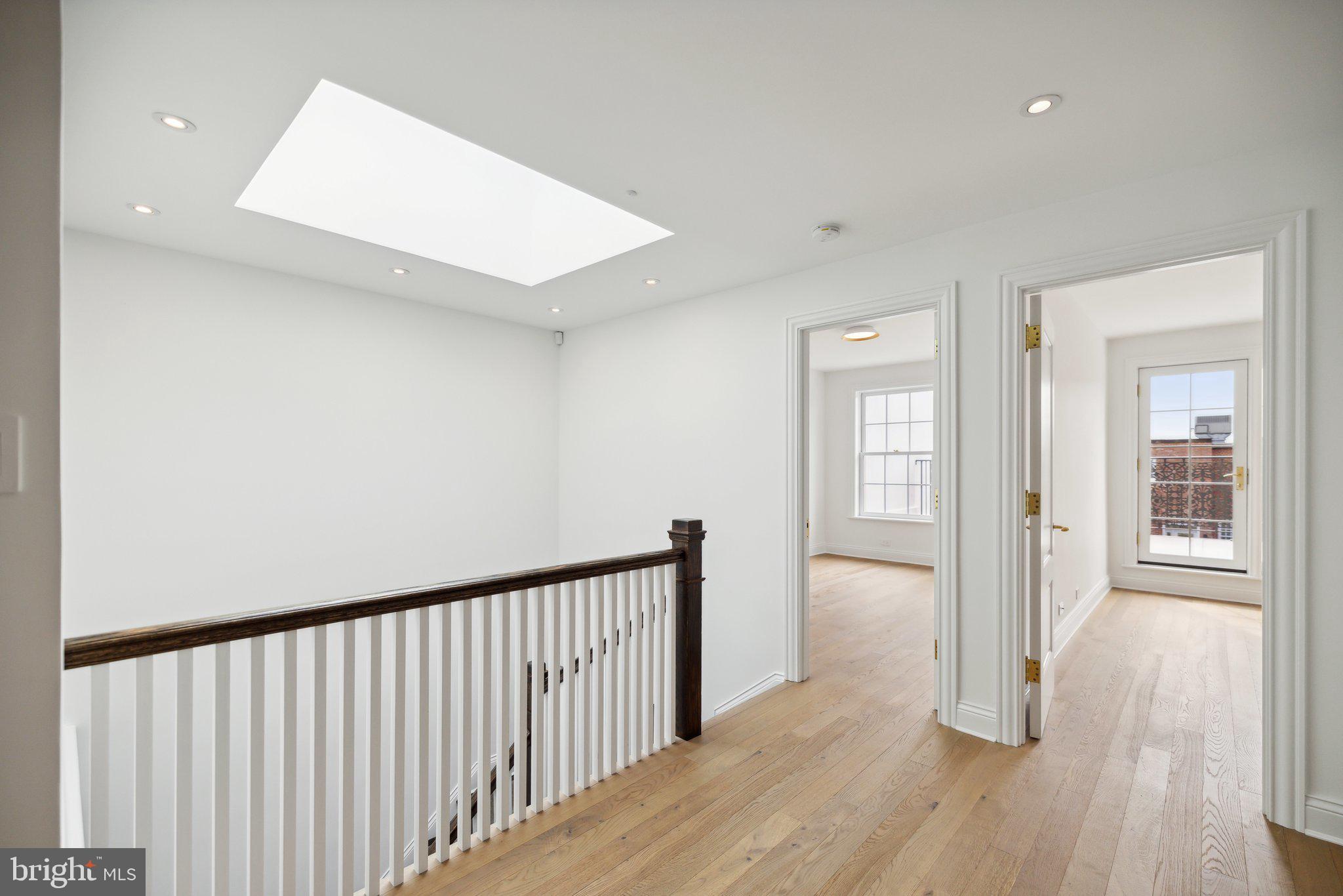 2120 Bancroft Place Northwest Washington, DC 20008 - Photo 20 of 30 a view of a hallway with wooden floor