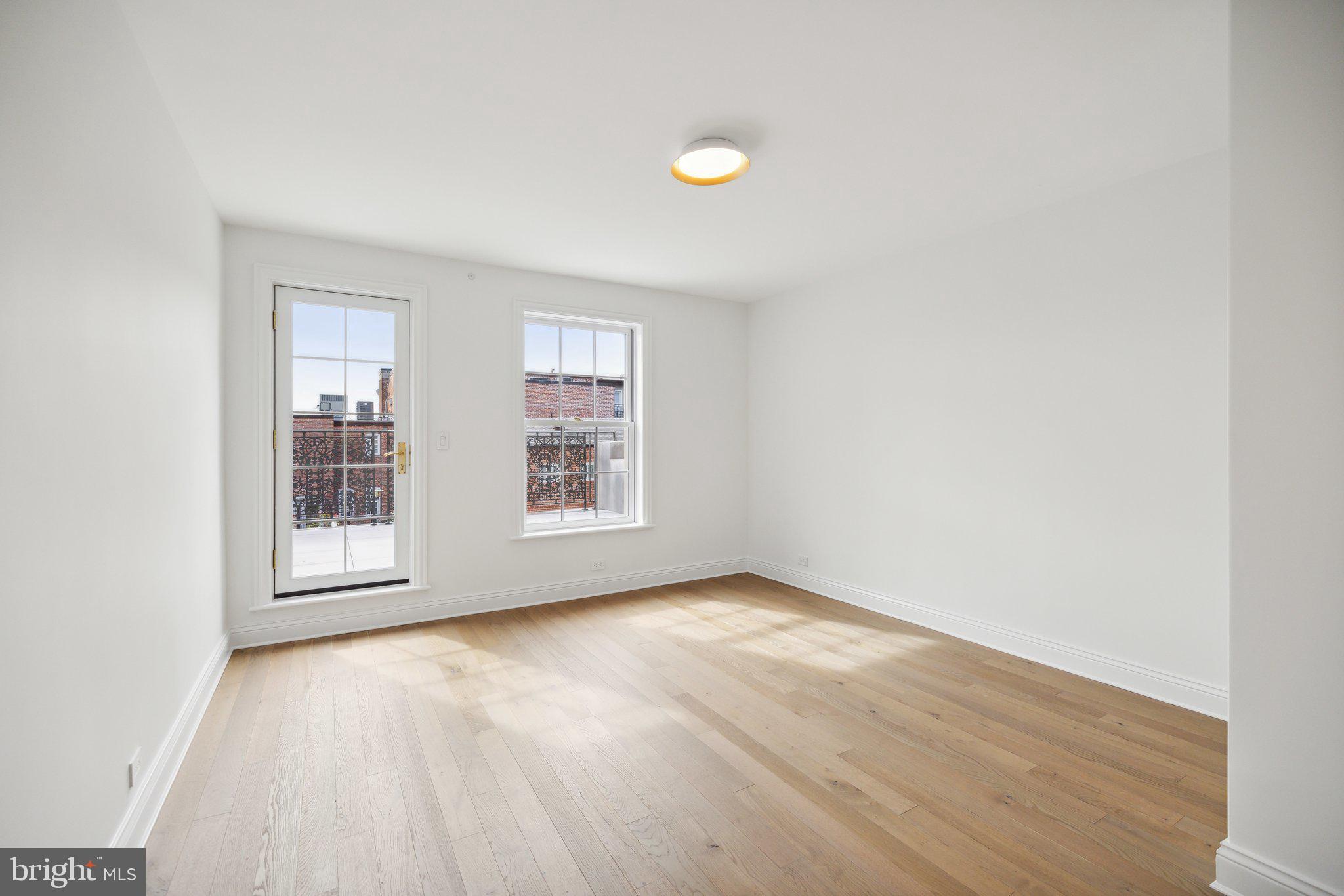 2120 Bancroft Place Northwest Washington, DC 20008 - Photo 23 of 30 an empty room with windows and closet