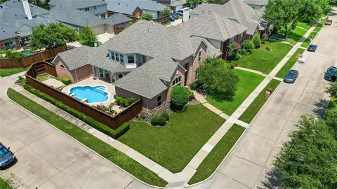 an aerial view of a house having patio