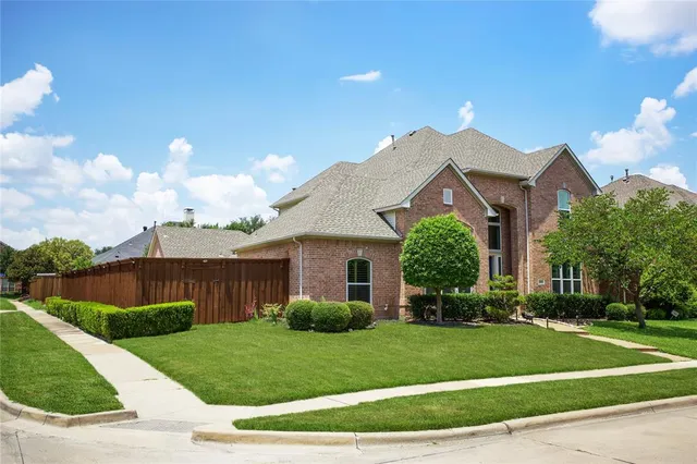 a backyard of a house with seating space