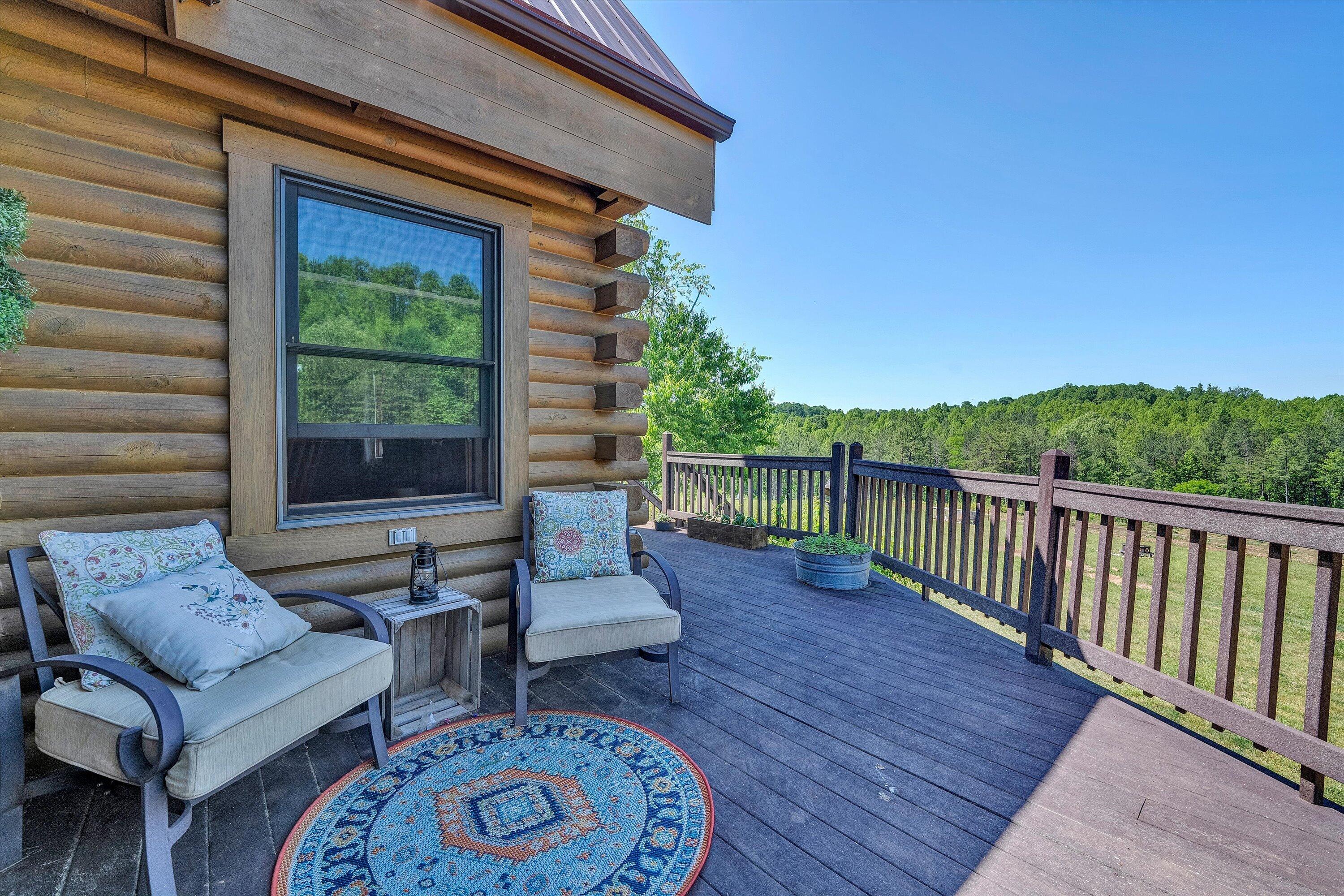 180 Thompson Ridge Circle Ferrum, VA 24088 - Photo 33 of 74 a view of a two chairs in the roof deck