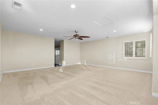 a bathroom with a double vanity sink mirror and bathtub
