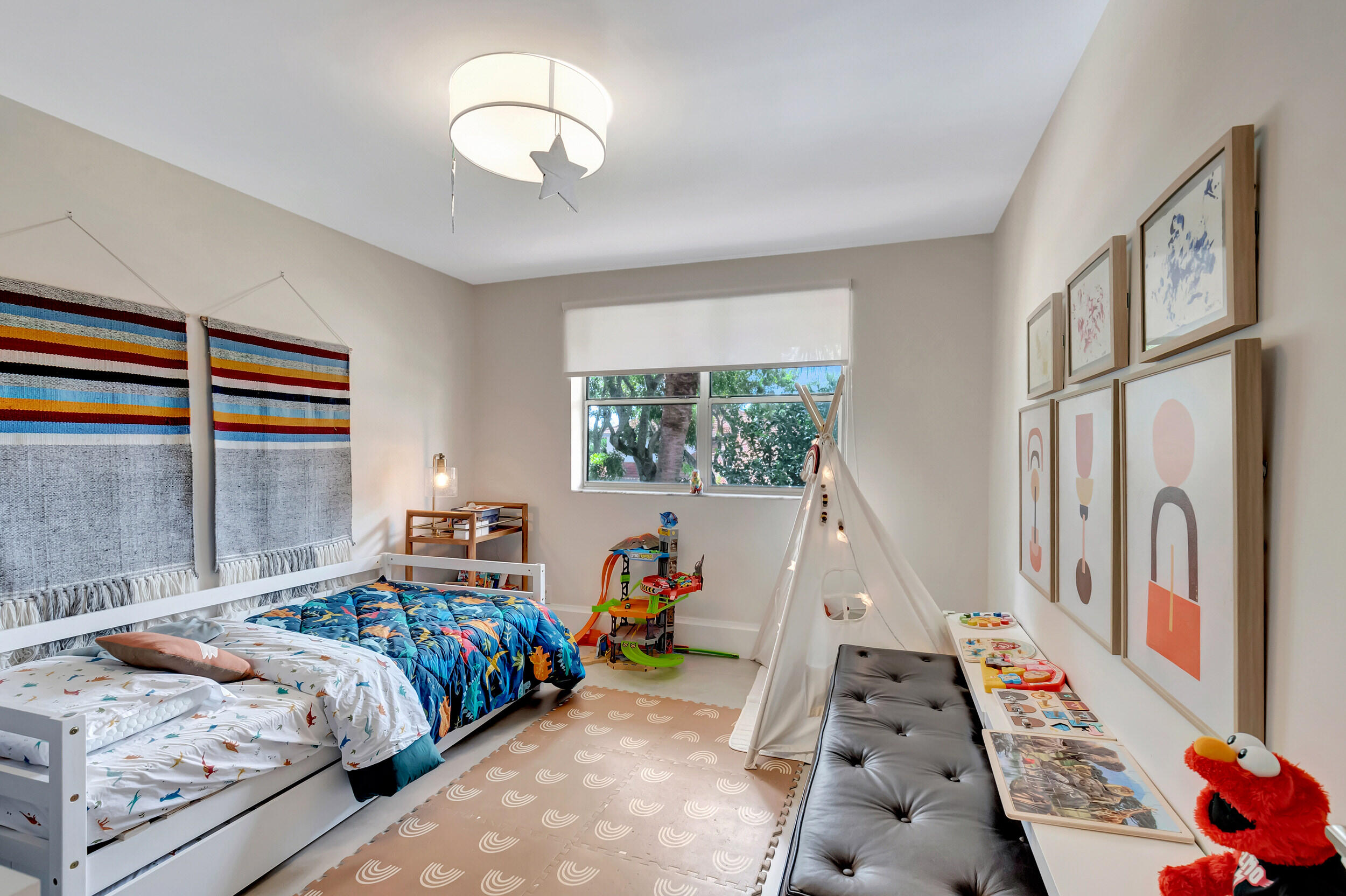 5254 Northwest 22nd Avenue Boca Raton, FL 33496 - Photo 30 of 50 a bedroom with furniture and a large window