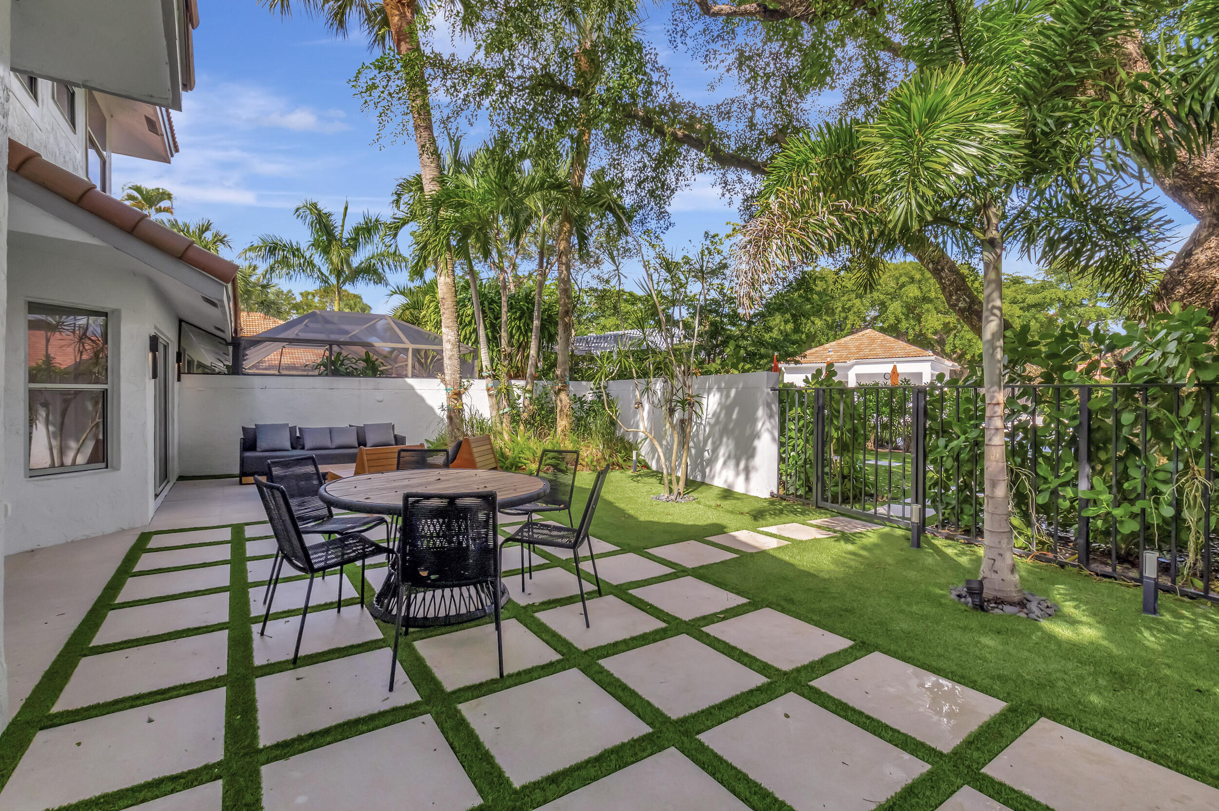 5254 Northwest 22nd Avenue Boca Raton, FL 33496 - Photo 32 of 50 a view of a backyard with sitting area