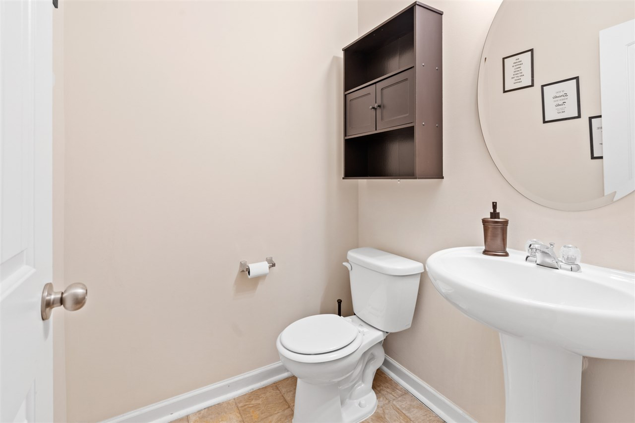 8151 Feldwig Place Raleigh, NC 27616 - Photo 14 of 28 Main Level Powder Room