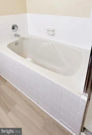 a bathroom with a bathtub
