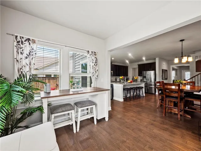 a bathroom with a toilet a sink and a mirror