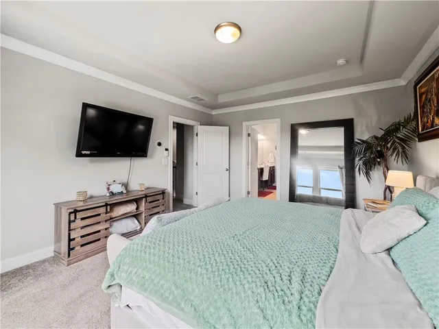a view of wooden floor with entryway