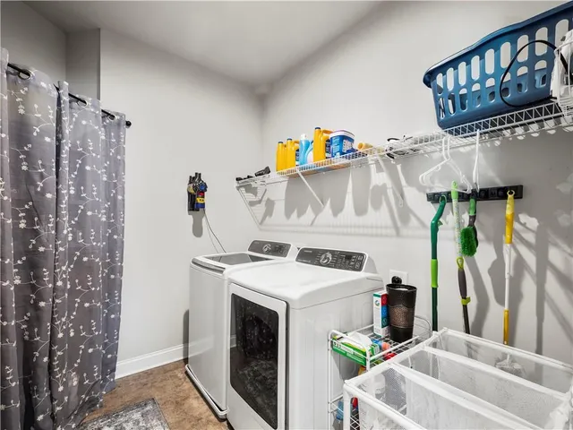 a patio with swimming pool and furniture