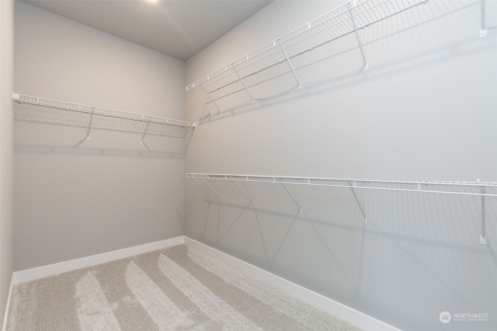 3900 Northeast 27th Place, Unit 3 Renton, WA 98059 - Photo 30 of 37 a view of a rack on the wall